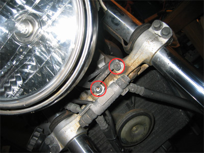 Headlight adjustment removal