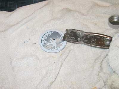 Removal of old peeling sticker.